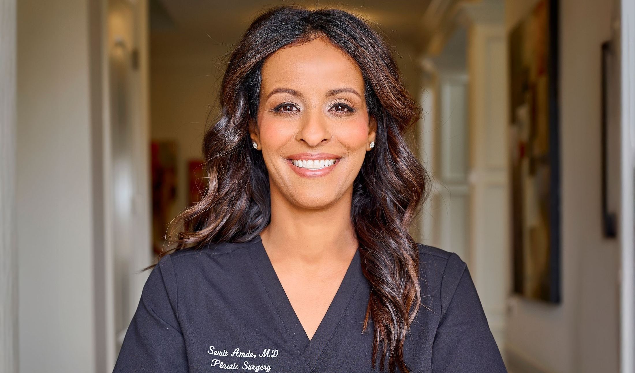 Young woman in stylish outerwear looking away.